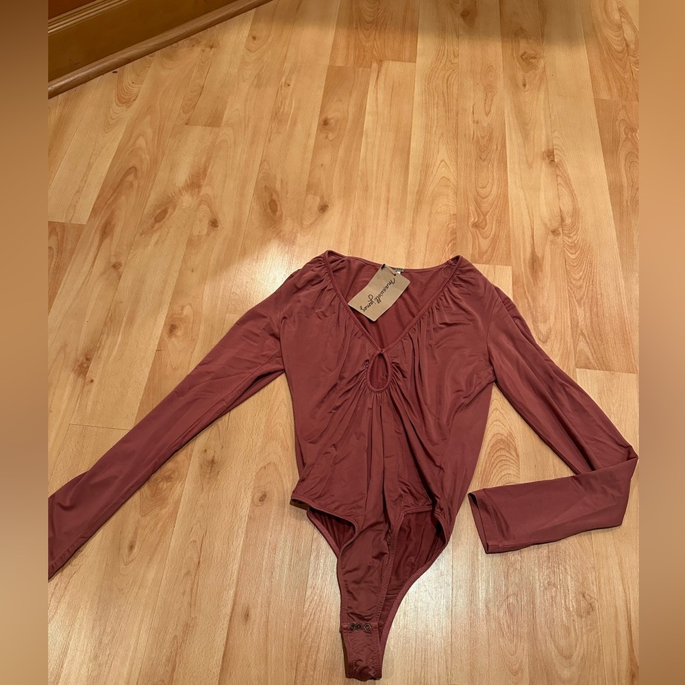 New with tags YFB body suit